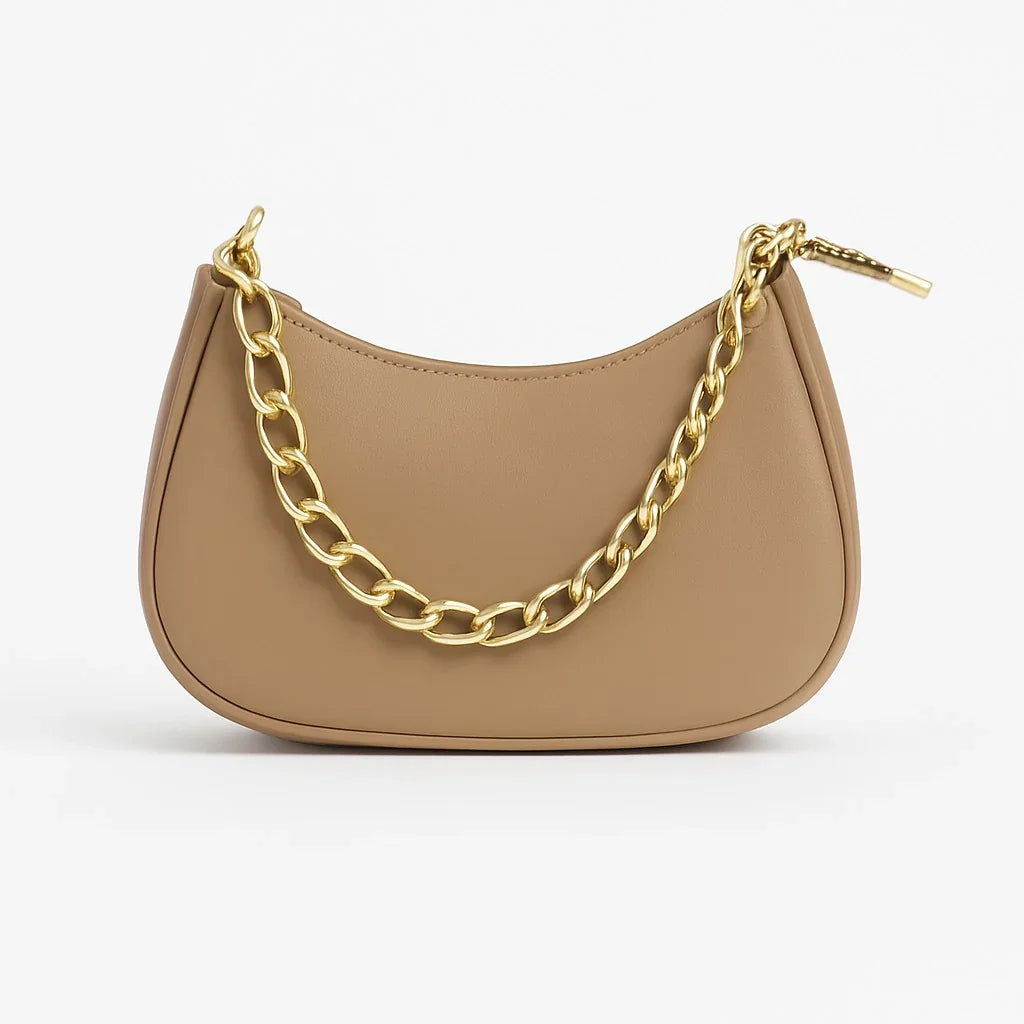 Tan leather handbag with gold chain strap from Bagvalley, luxury purse on white background.