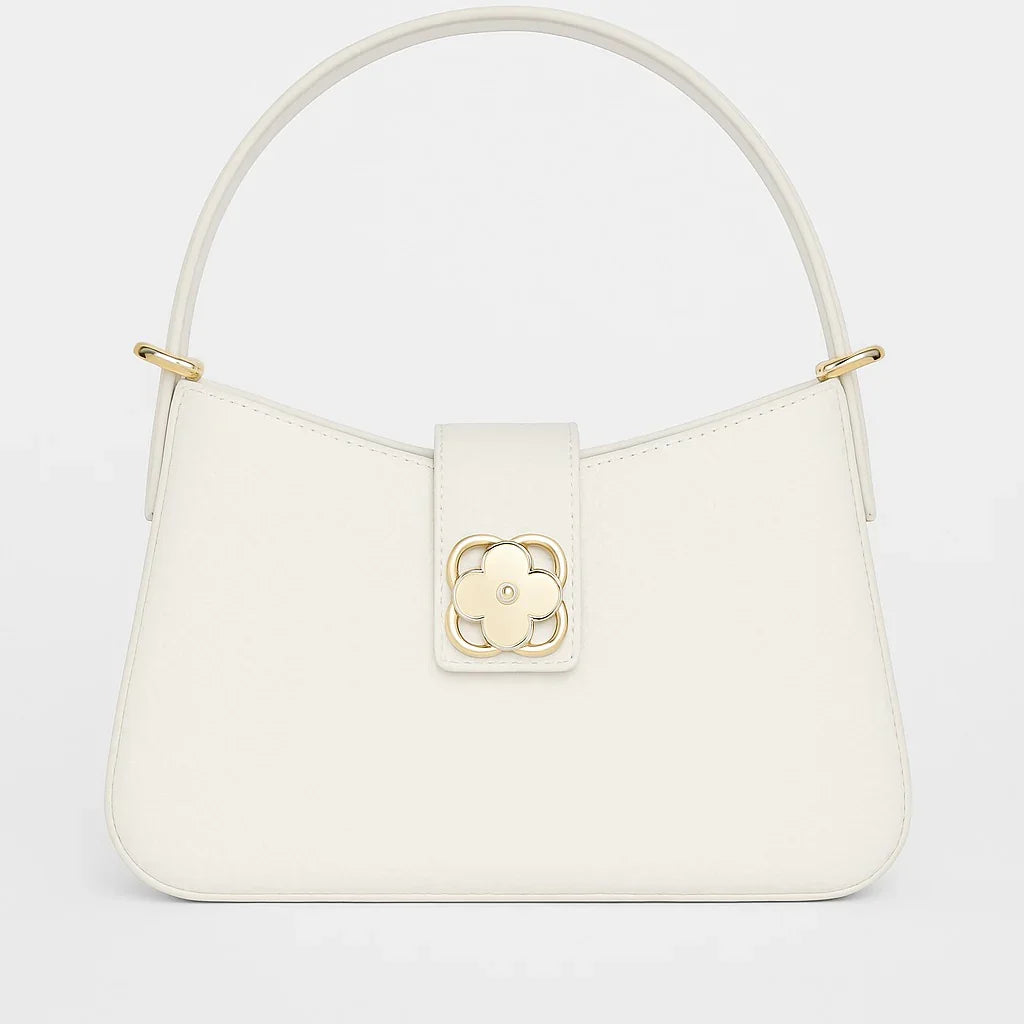 Elegant white handbag with gold floral clasp and top handle from Bagvalleypk premium collection