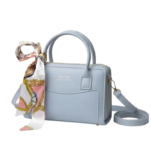 Light blue handbag with top handle, gold details, silk scarf accent, from Bagvalley