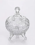 Elegant clear glass jar with floral patterns, decorative lid, and three legs, Bagvalleypk home decor.