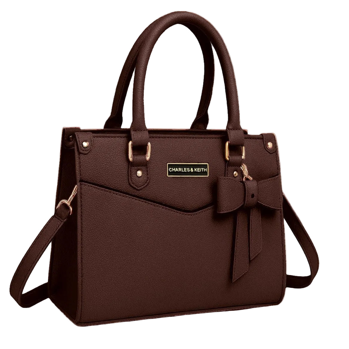 Brown handbag with a bow detail on a white surface, featuring the brand 'Charles & Keith'.
