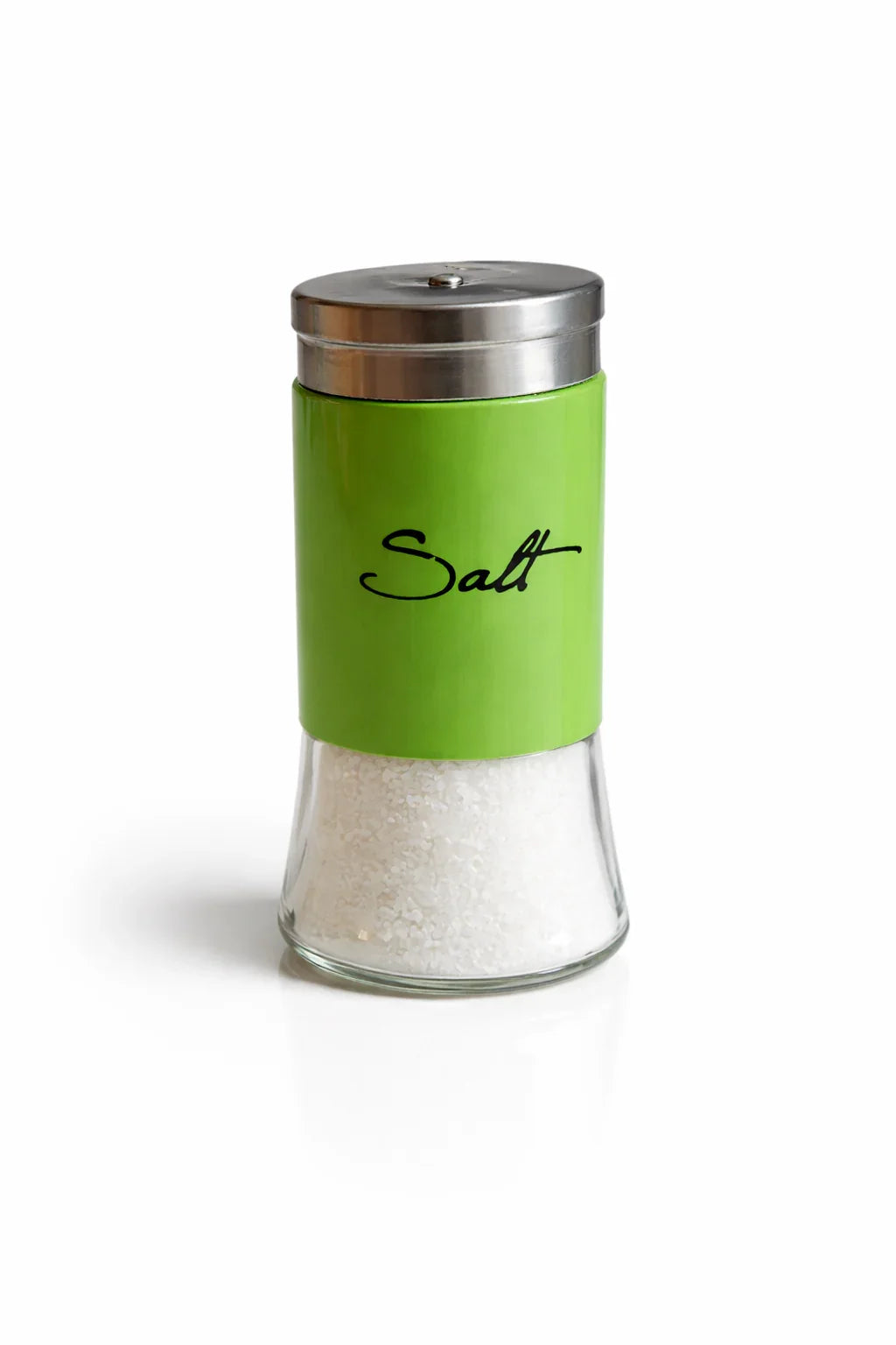 Glass salt shaker with green label and metal lid, filled with coarse salt, on white background.